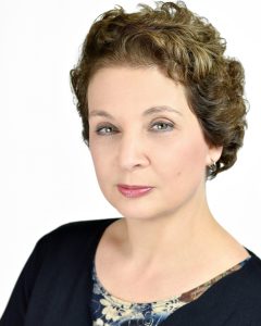 Headshot of Nora Ambrosio.