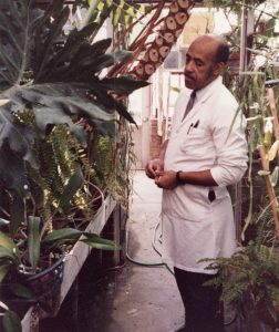 Thomas Gaither in greenhouse.