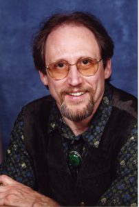 Headshot of Patrick Burkhart.