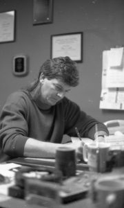 Thom Cobb working at a desk.