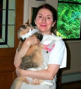 Susan Ferrandiz holding a cat.