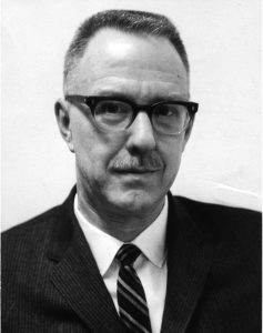 Headshot of Carl Laughner.